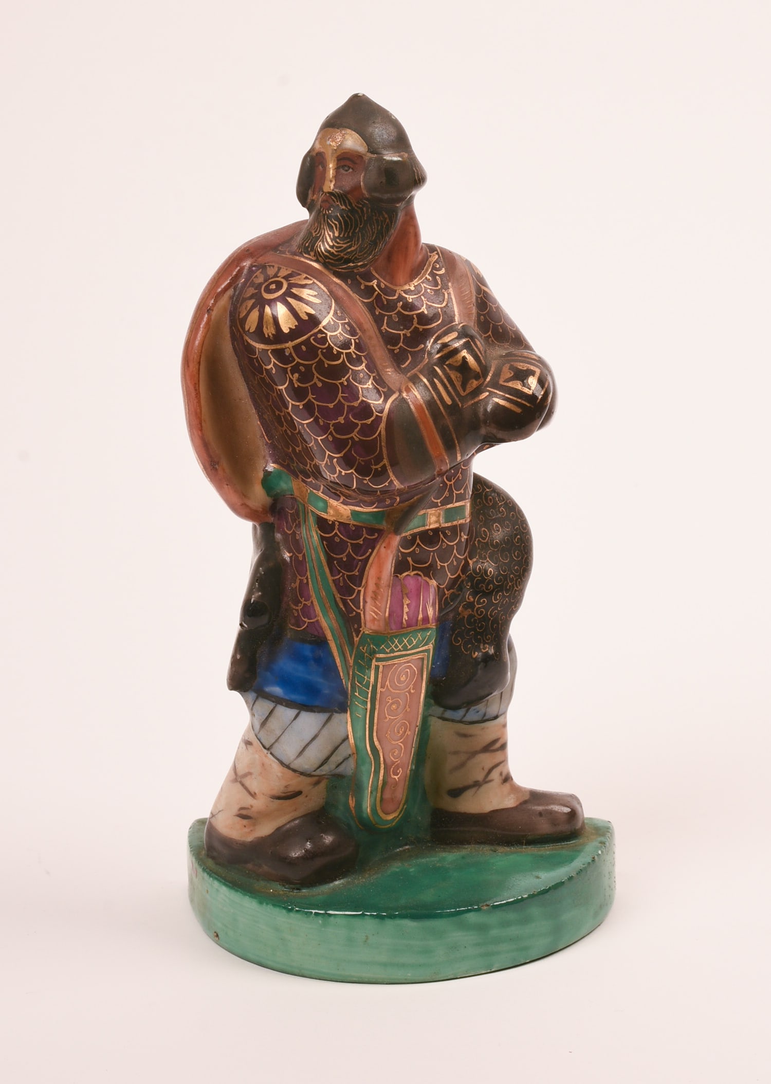 RUSSIAN PAINTED PORCELAIN FIGURE OF A HISTORICAL WARRIOR. (1 of 7)