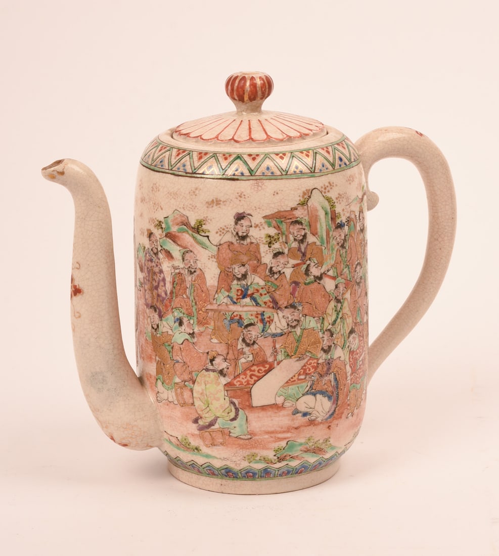 JAPANESE SATSUMA TEAPOT.: Decorated with many scholars in a landscape, illegible impressed mark on bottom, c. 1900. Height 6.25 inches.
