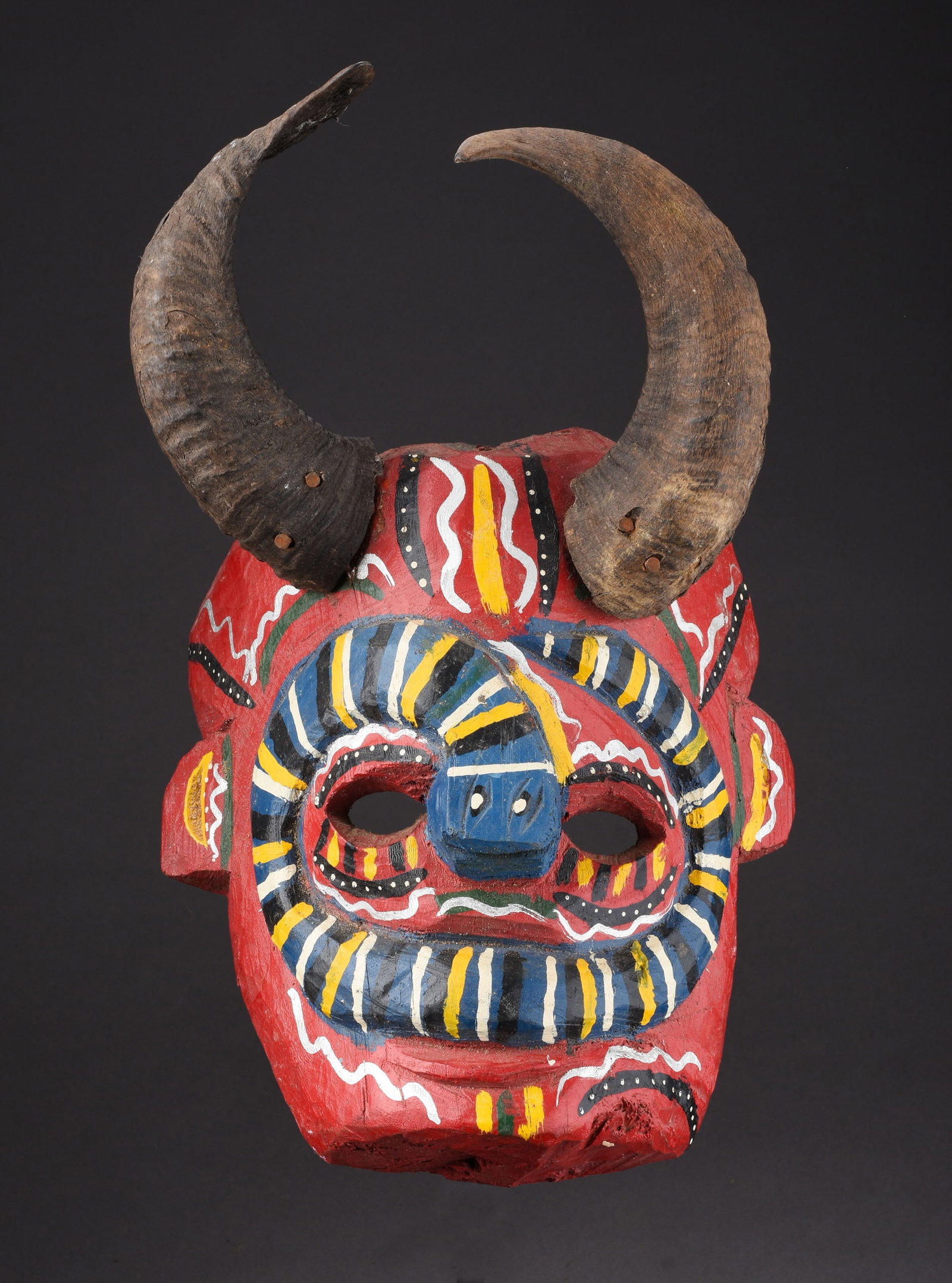 IGBO INITIATION MASK: Overall height 13 inches. A mask of this type is given to a young boy who needs courage, strength and motivational support to assist him overcome the stress, and the spirit of stagnation, delays , dep