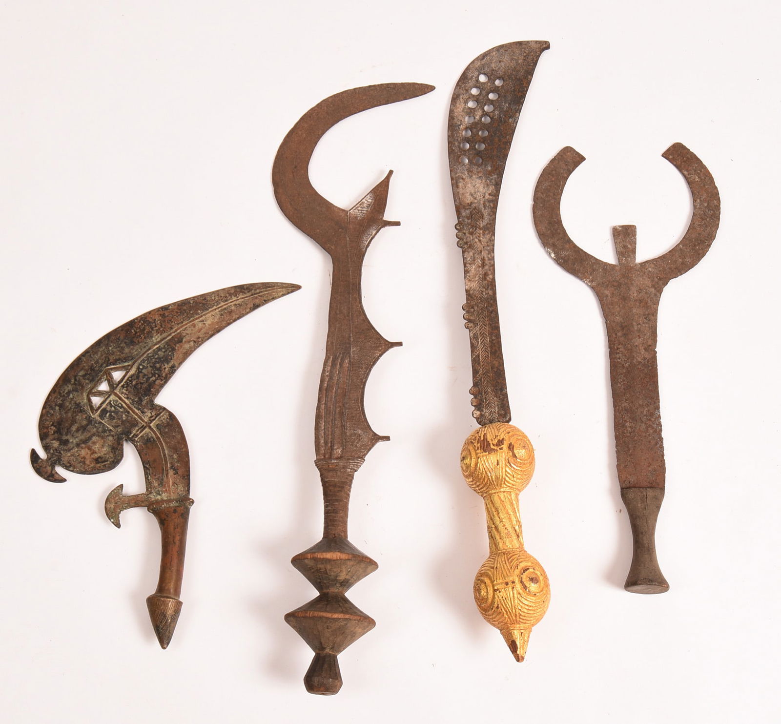 FOUR AFRICAN WEAPONS. (1 of 2)