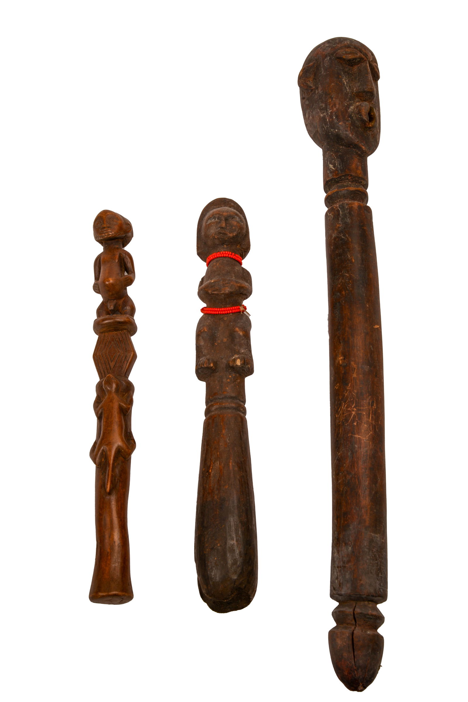 THREE AFRICAN CARVED STAFFS. (1 of 3)