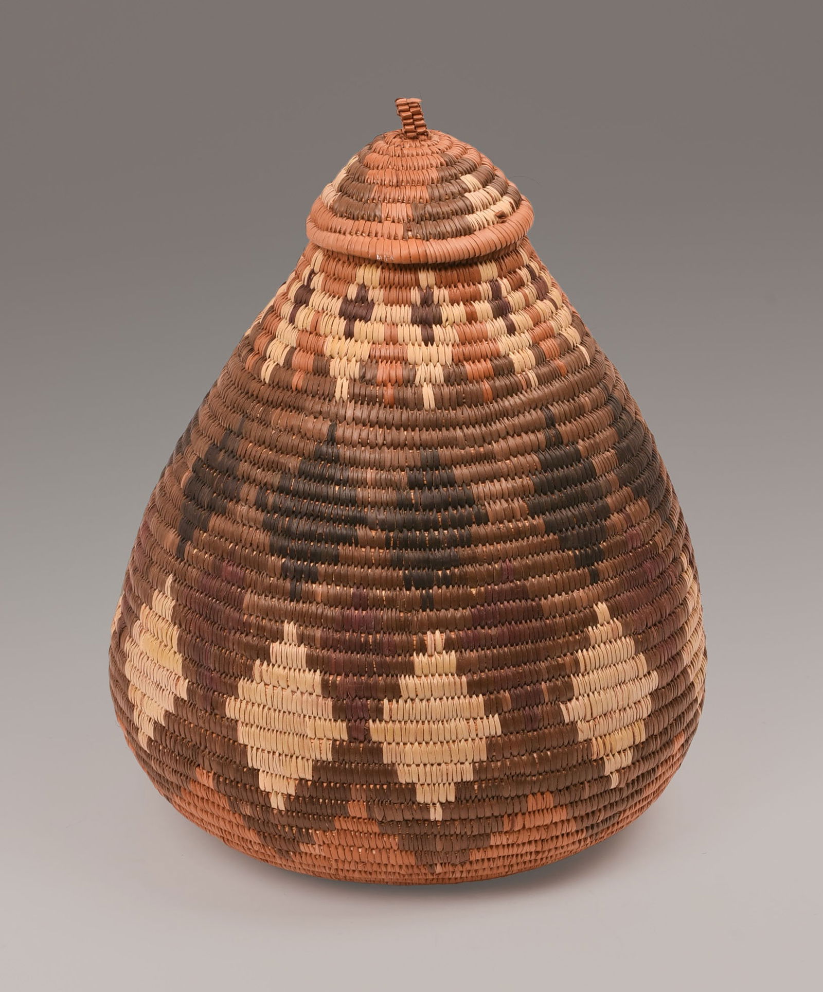 AFRICAN WOVEN LIDDED BASKET. (1 of 4)