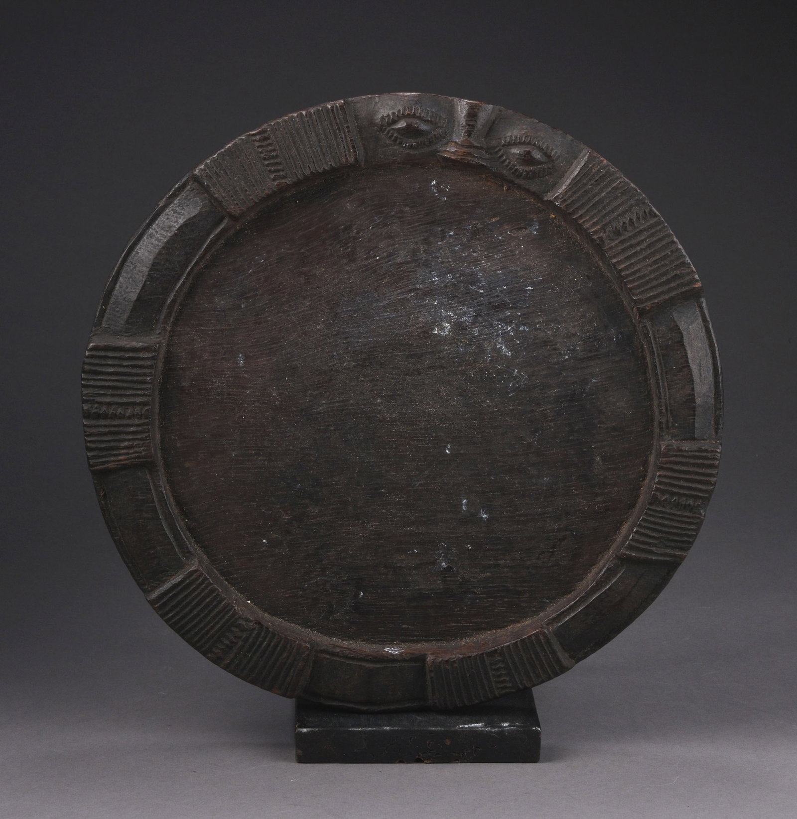 IFA DIVINATION BOARD (OPON IFA) YORUBA NIGERIA: Diameter 11 inches. Ifa ( also called Orunmila and Agbonniregun) is the Yoruba god of divination. He transmits and interprets the wishes of Olorun, the sky god, who created all other gods and deities.