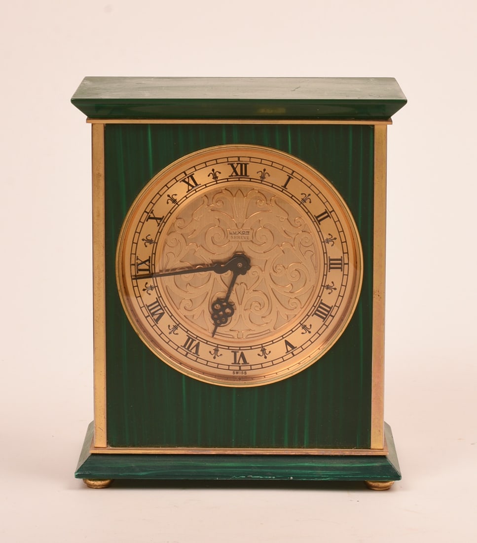 SHREVE LUXOR CLOCK WITH MALACHITE FINISH.: Height 7 1/8 inches.