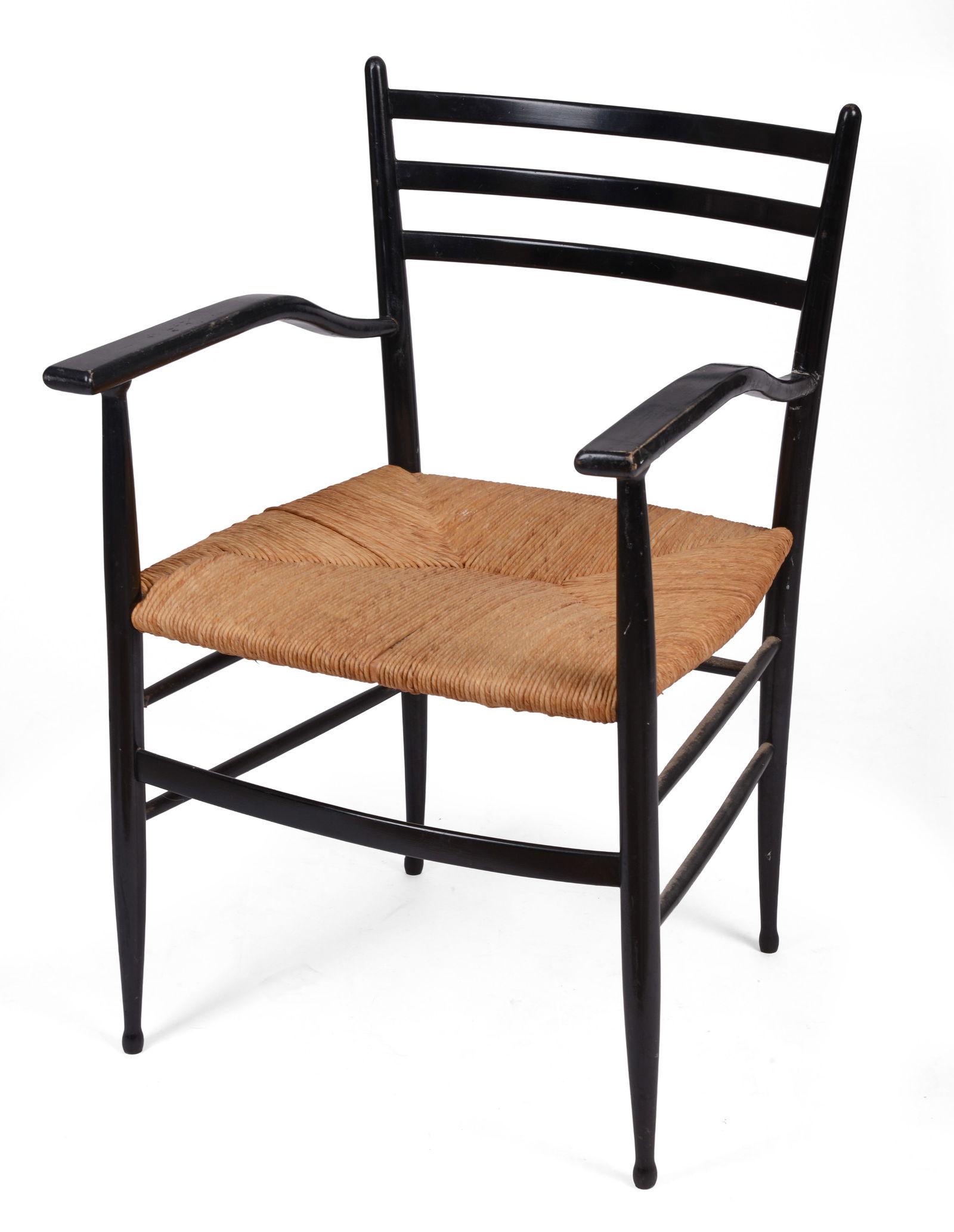 Enrico Delmonte ‘Gobbetta’ Armchair.: Black lacquered beechwood with straw seat, signed, model 573, Chiavari, Italy, c. 1965. Seat height 17 inches, overall height 32 inches. Some minor surface scratches.