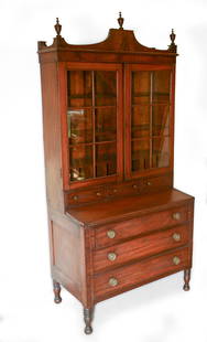 Massachusetts Sheraton Desk and Secretary.: Height 75 inches, width 37 inches, depth 20 inches. Some age-related wear, brasses with broken backplates. SHIPPING: We offer very competitively priced in house shipping for all items in this sale.