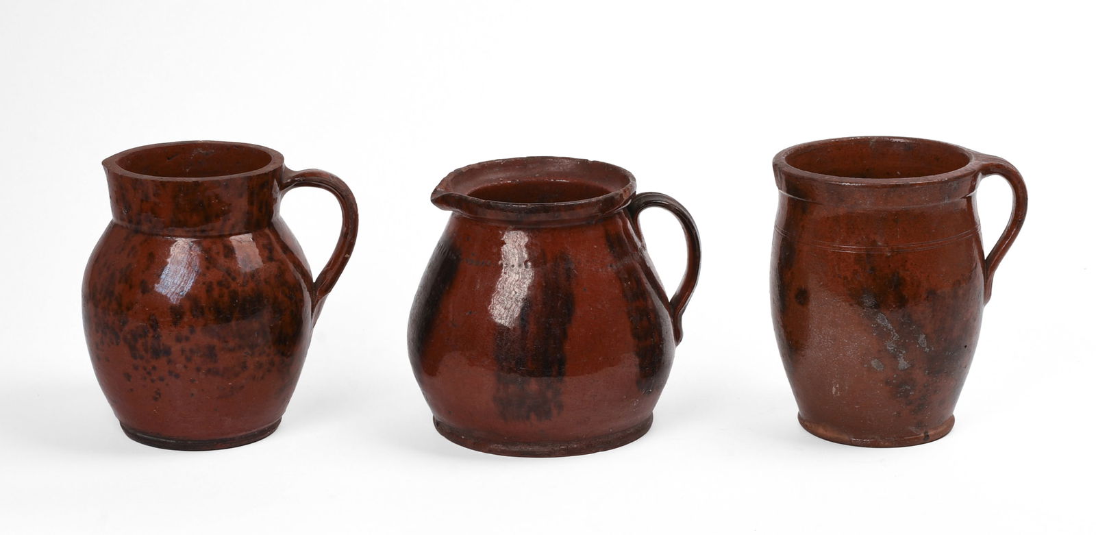 Three New England Redware Pitchers. (1 of 5)