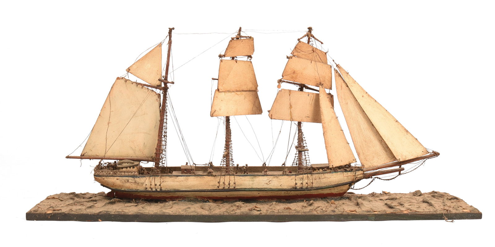 Folk Art Model of a Three-Masted Schooner.: Length of base 32 inches. SHIPPING: We offer very competitively priced in house shipping for all items in this sale. Please contact us for a quote.