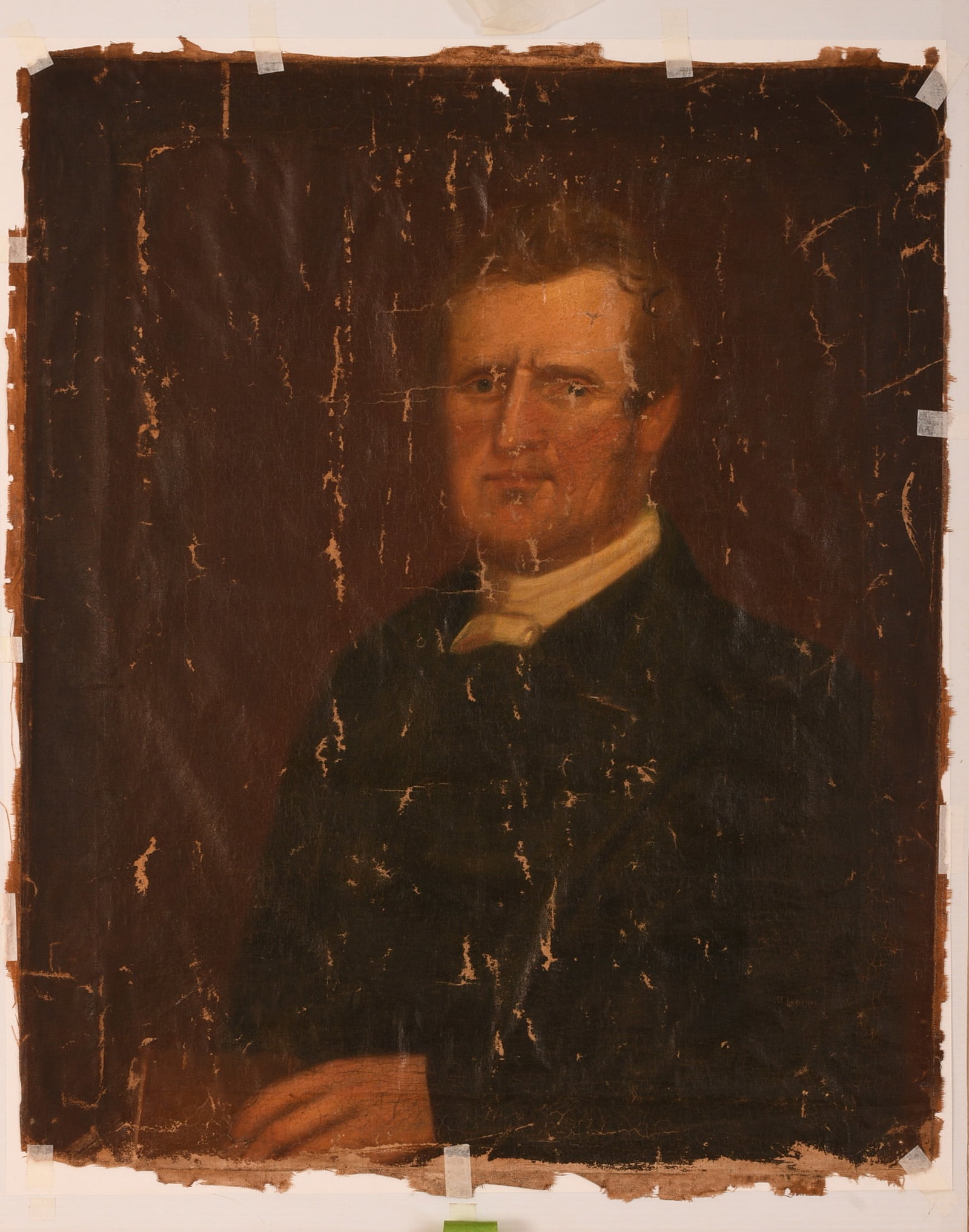American School Portrait of a Man.: Oil on canvas, 30 x 25 inches. Unmounted, with losses, in need of restoration. SHIPPING: We offer very competitively priced in house shipping for all items in this sale. Please contact us for a quote.