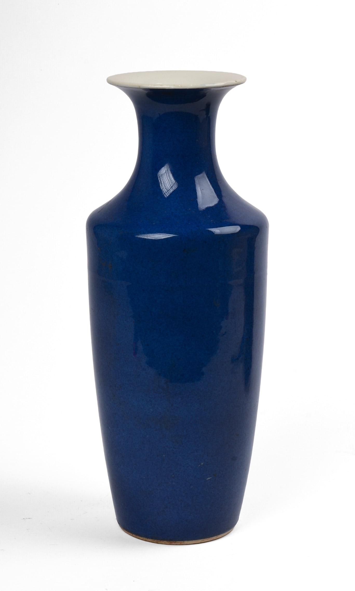 Chinese Powder Blue Porcelain Vase.: 19th c. Height 10.25 inches. Hairlines, drilled for use as a lamp. SHIPPING: We offer very competitively priced in house shipping for all items in this sale. Please contact us for a quote.