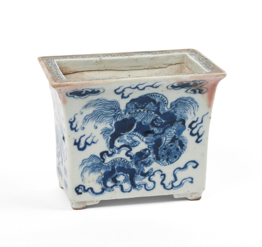Chinese Blue and White Porcelain Planter.: Foo dog decoration, 19th c. 6 x 4.25 x 4 inches. Old repair at the rim. SHIPPING: We offer very competitively priced in house shipping for all items in this sale. Please contact us for a quote.