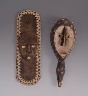 African Carved Plaque and a Handheld Mask.: Plaque 18 x 6 inches, mask height 16 inches. SHIPPING: We offer very competitively priced in house shipping for all items in this sale. Please contact us for a quote.