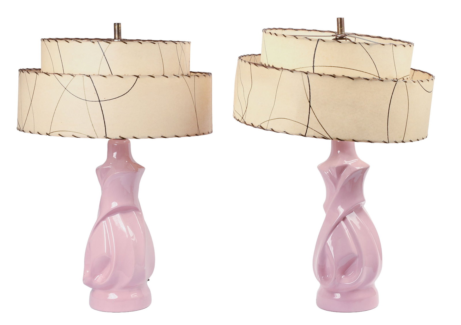 Pair of Pink Mid Century Lamps.: Height 25 inches. Good condition, all electrical fixtures sold as is. IN HOUSE SHIPPING: We offer very competitively priced in house shipping for all items in this sale. Please contact us for a quote.
