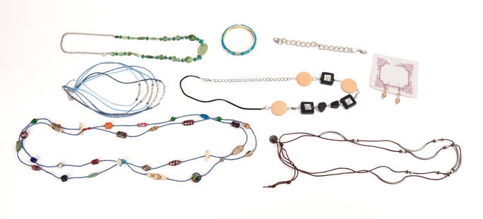 Collection of Costume Jewelry.: Five necklaces, two bracelets, and a pair of earrings. IN HOUSE SHIPPING: We offer very competitively priced in house shipping for all items in this sale. Please contact us for a quote.