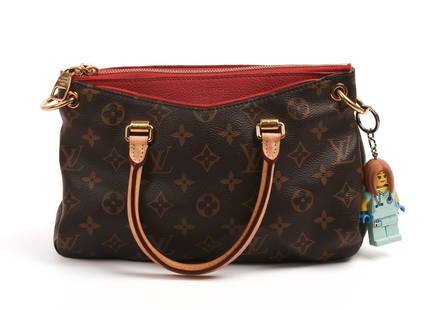 Louis Vuitton Handbag.: With dustbag. Height of bag 6 7/8 inches, width 10 1/4 inches. IN HOUSE SHIPPING: We offer very competitively priced in house shipping for all items in this sale. Please contact us for a quote.