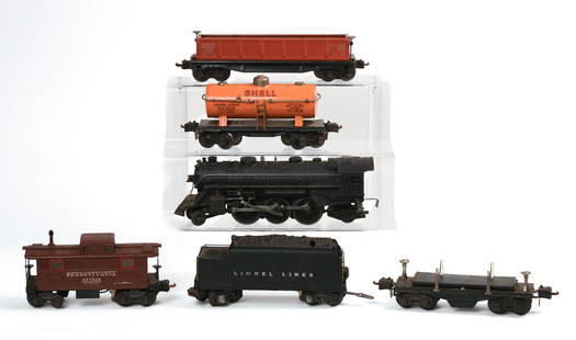 Lionel O Gauge 224 Locomotive and Five Cars.: 2654 Tank Car, 2812 Gondola, 2224W Whistle Tender, and two others. Four in original boxes. Good condition, boxes are worn. IN HOUSE SHIPPING: We offer very competitively priced in house shipping for a