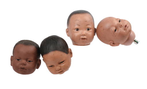 Four Automaton Doll Heads: Heights 5 inches. IN HOUSE SHIPPING: We offer very competitively priced in house shipping for all items in this sale. Please contact us for a quote.