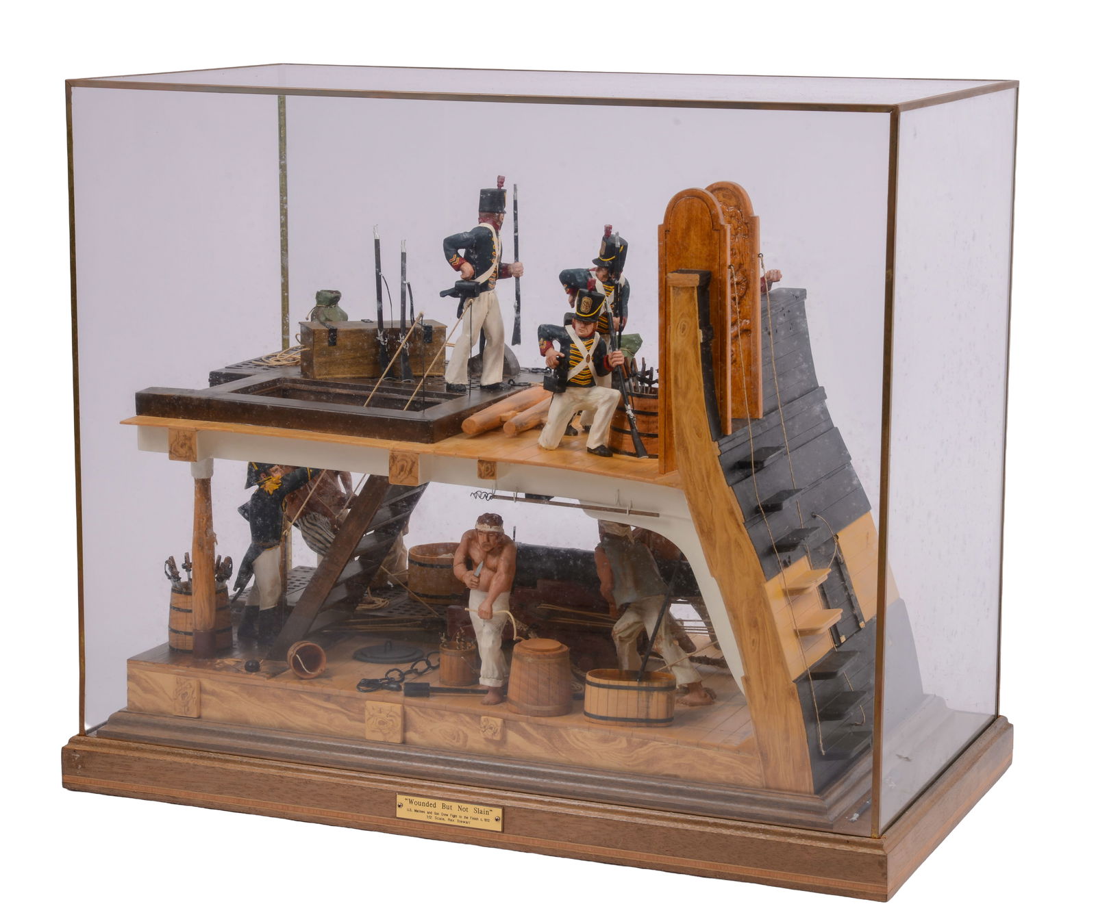 WAR OF 1812 DIORAMA.: Titled 'Wounded But Not Slain', glass case 22.5 x 26 x 14 inches. One pane of glass missing on case. IN HOUSE SHIPPING: We offer very competitively priced in house shipping for all items in this sale.