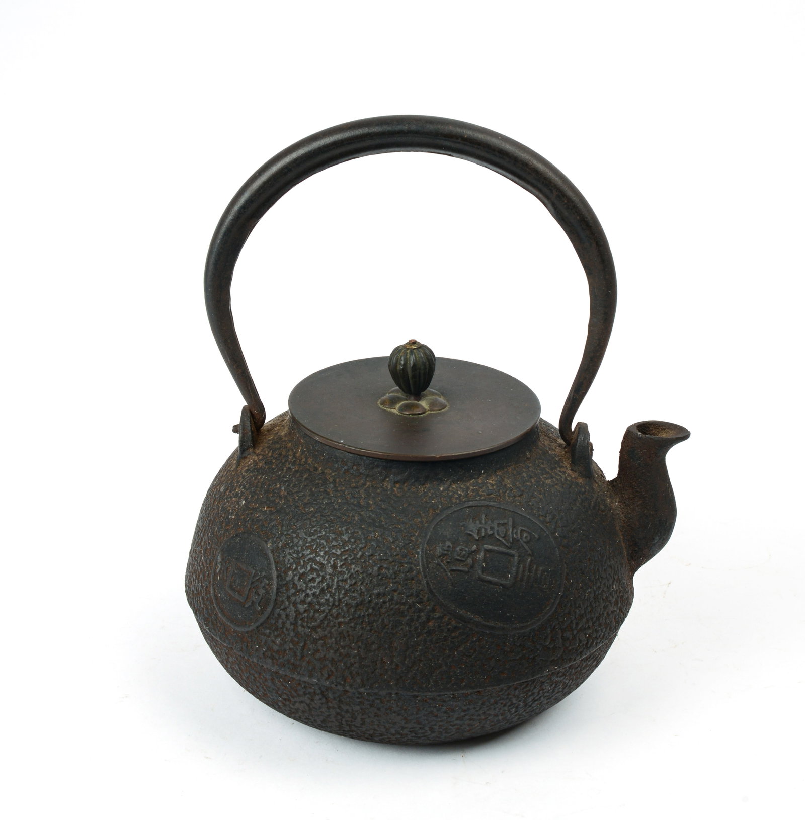 JAPANESE IRON TEAPOT: Chinese coin decoration, signed bronze lid, 19th century. Height over handle 8 inches.