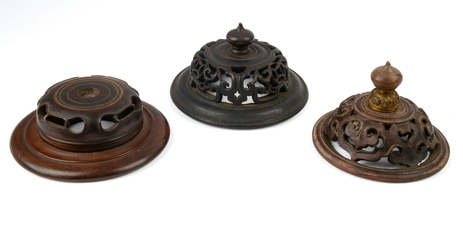 THREE CARVED CHINESE WOODEN JAR LIDS (1 of 4)