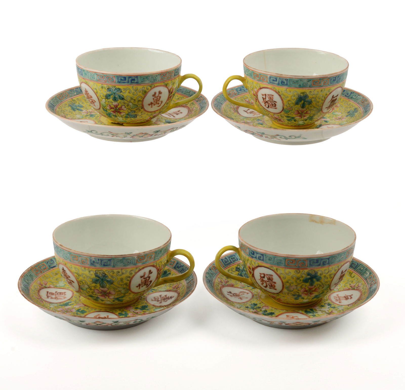 FOUR CHINESE YELLOW GROUND FAMILLE ROSE PORCELAIN CUPS AND SAUCERS (1 of 6)