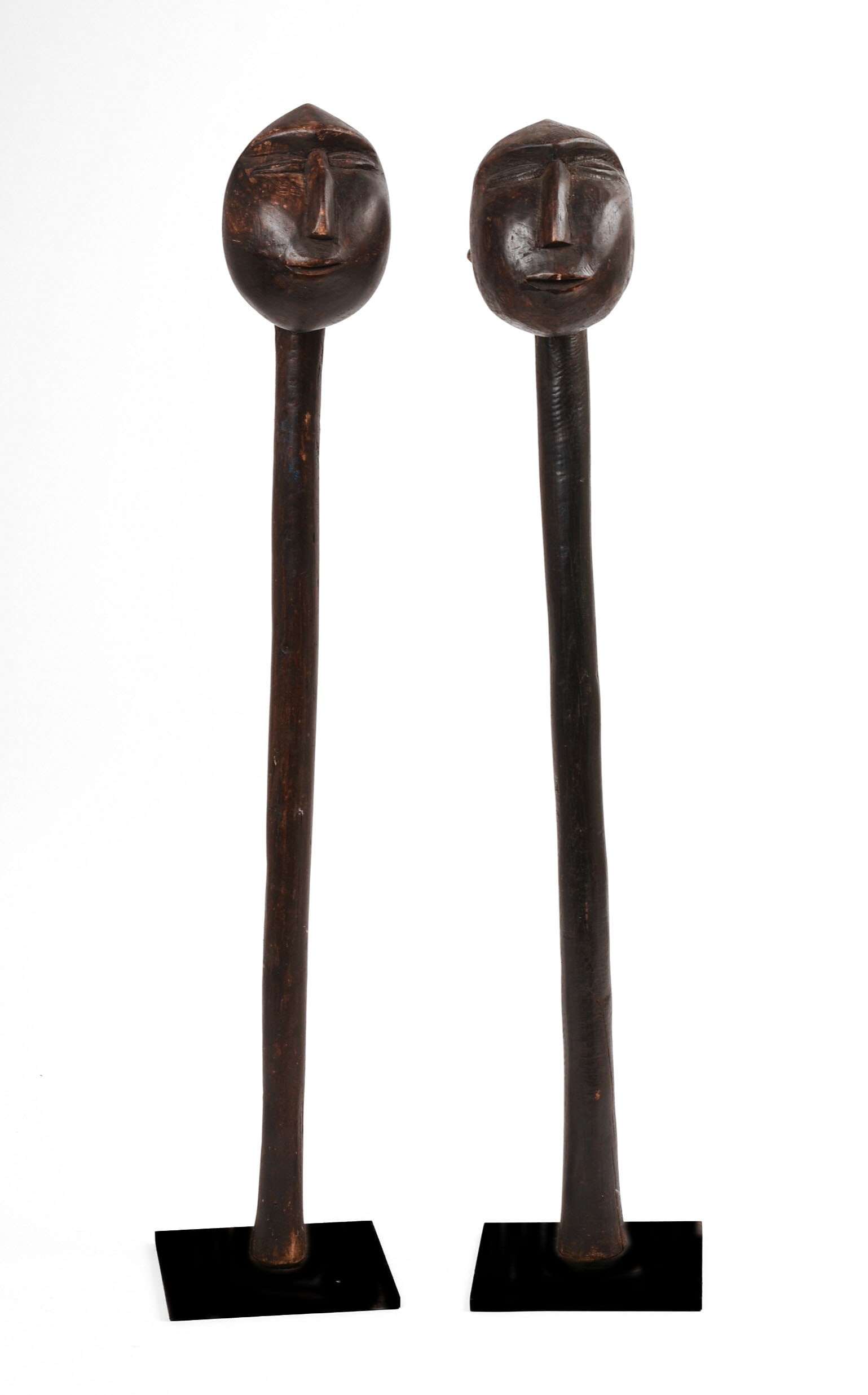 TWO AFRICAN CARVED WOODEN CLUBS. (1 of 6)