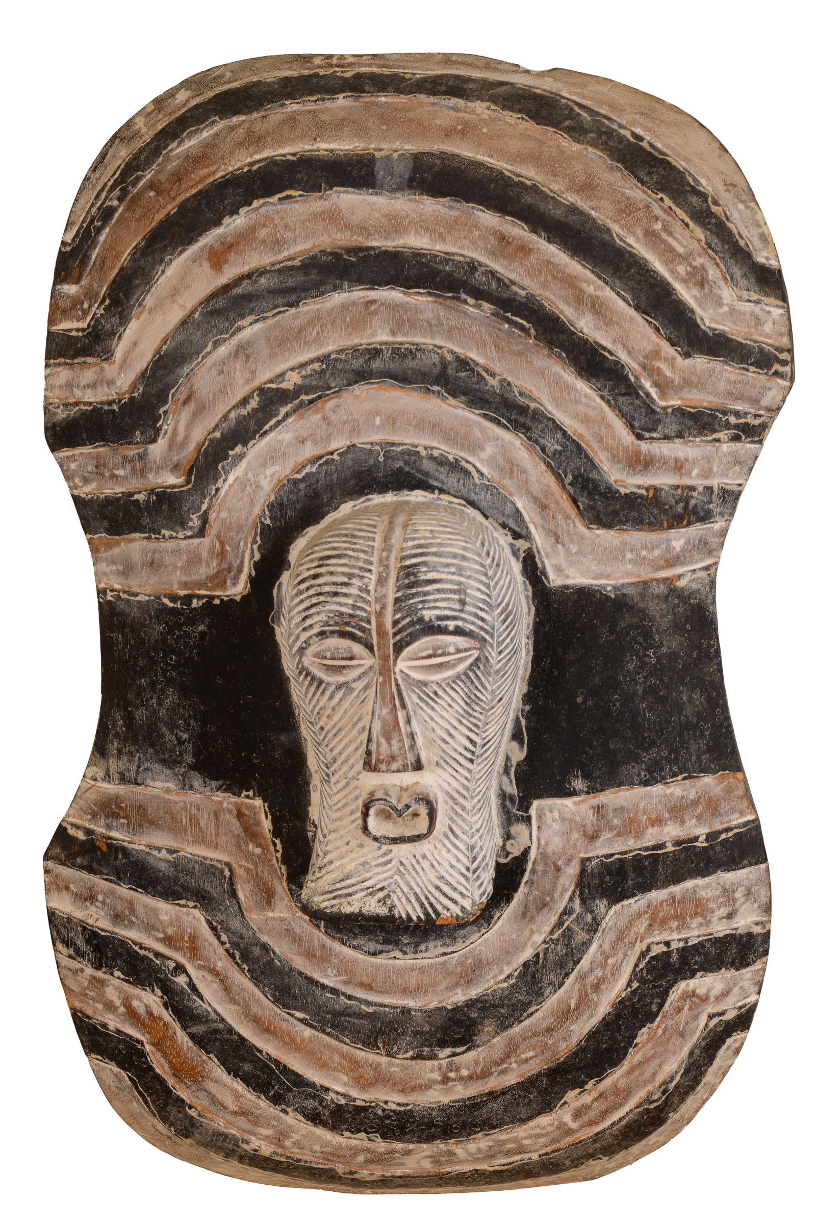 AFRICAN CARVED WOODEN SHIELD. (1 of 2)