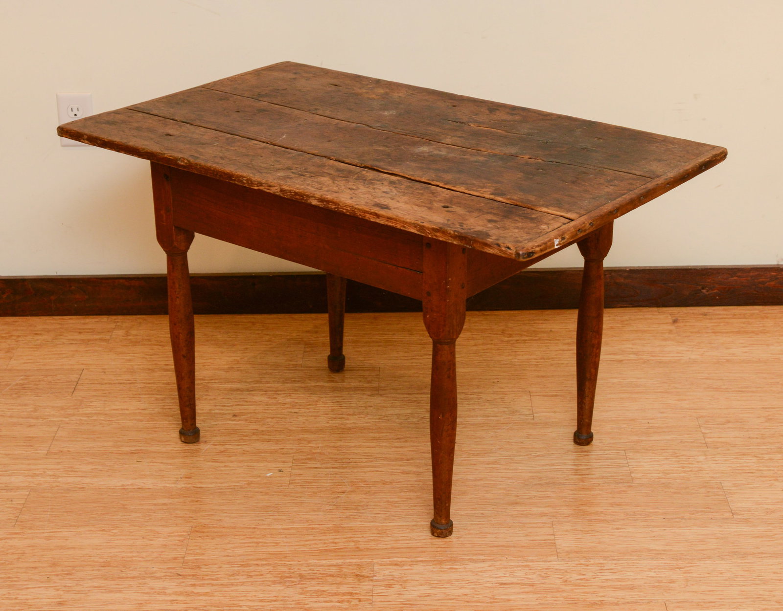 NEW ENGLAND MAPLE TAP TABLE IN RED PAINT.: Height 29.5 inches, top 40 x 24 inches. Good condition, some wear consistent with age.
