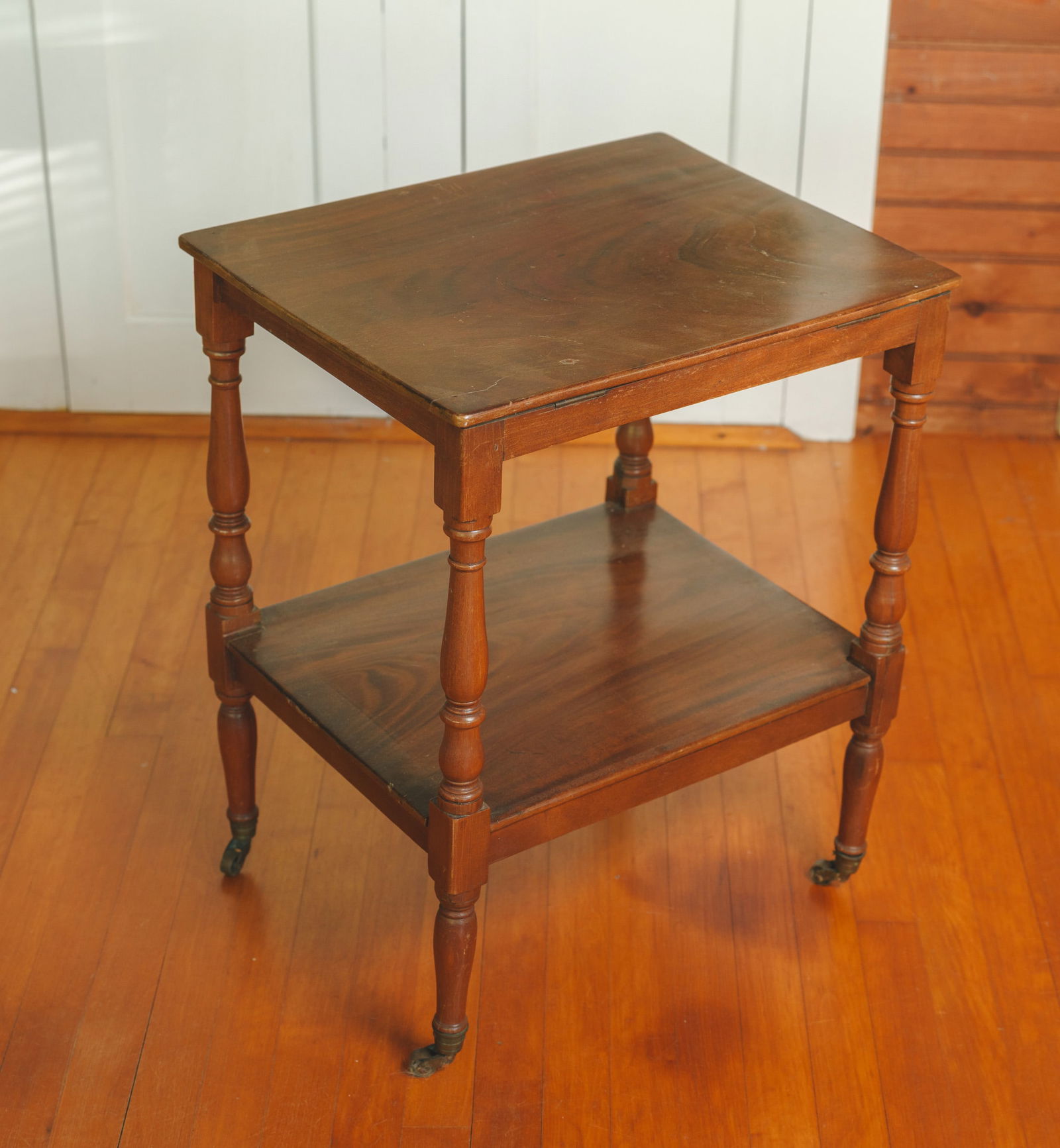 Two Tier Rolling Table.: Height 25 inches, width 20 inches, depth 16.5 inches.