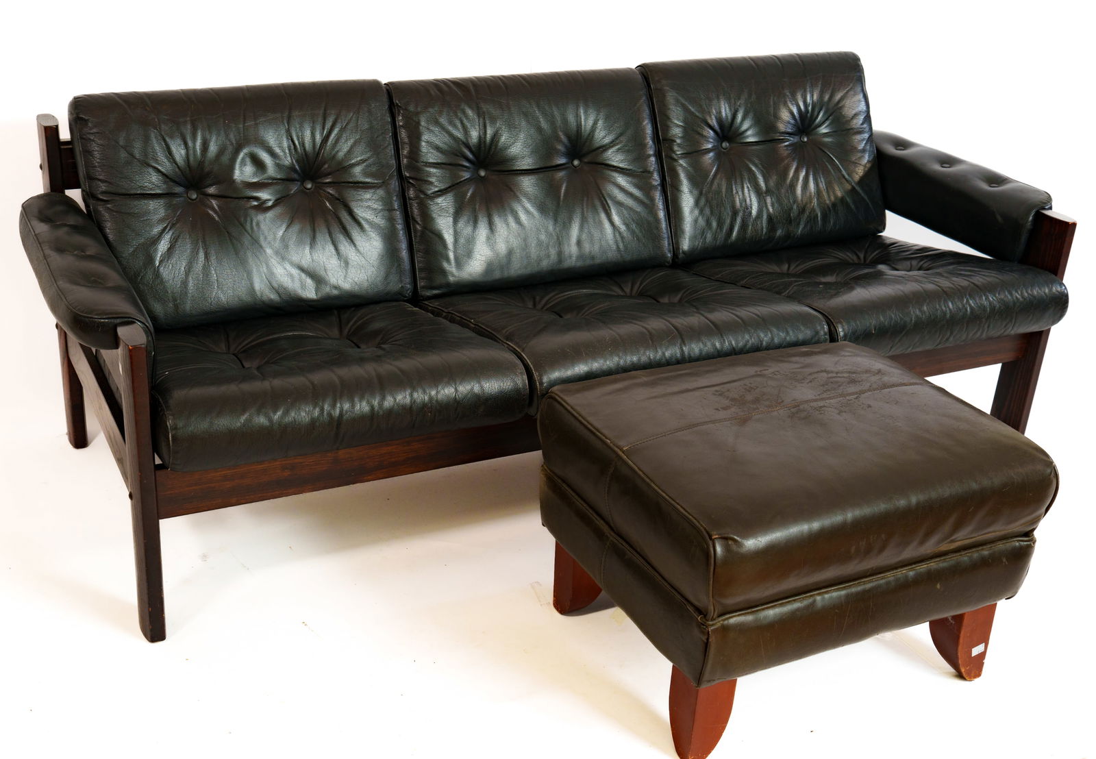 MID CENTURY MODERN BLACK LEATHER SOFA AND OTTOMAN. (1 of 10)