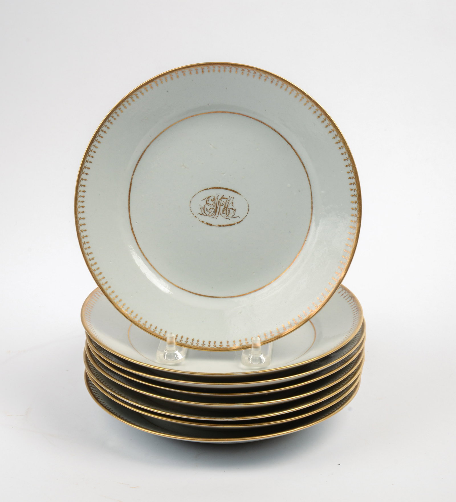EIGHT CHINESE EXPORT PLATES.: White and gold with monogram in center. Diameter 7.5 inches.