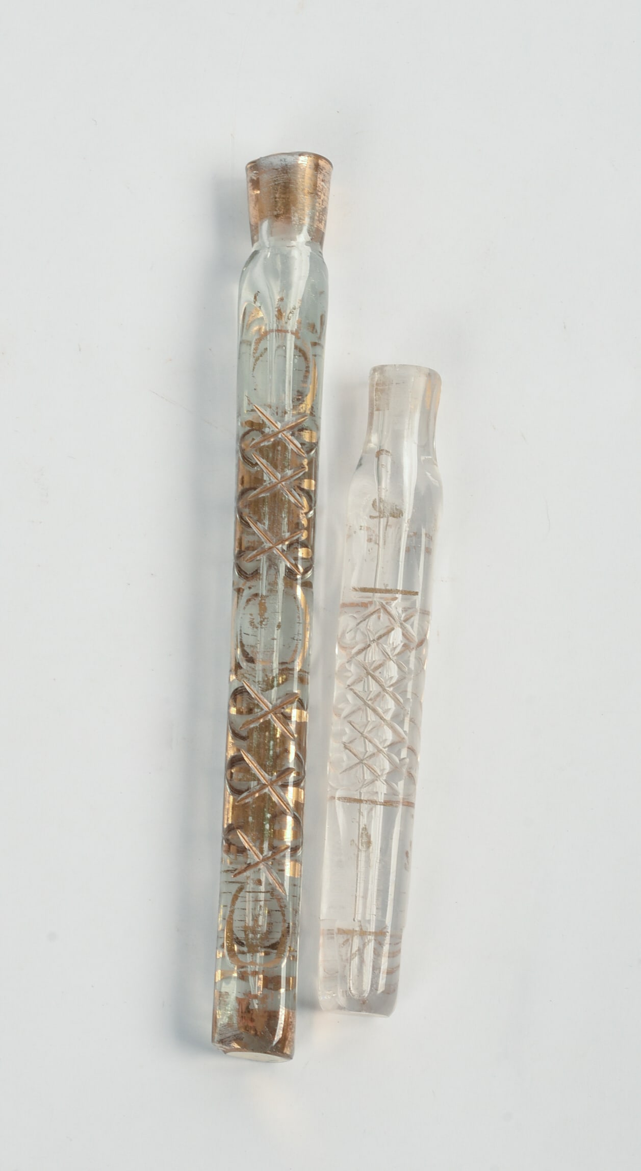 TWO VICTORIAN GLASS LACHRYMATORIES.: Lengths 4.5 and 6.5 inches.