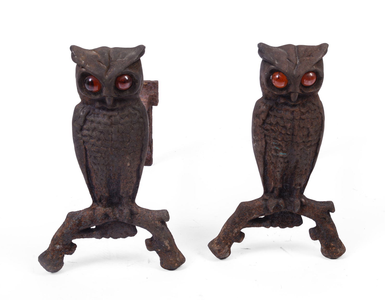 PAIR OF CAST IRON OWL ANDIRONS: Amber colored eyes, height 13 inches, depth 15 inches.