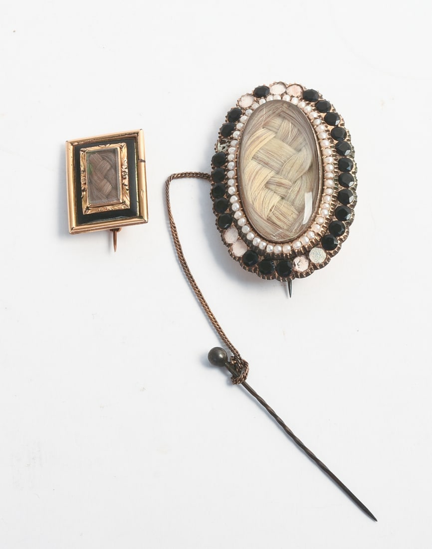 TWO NINETEENTH CENTURY MOURNING BROOCHES. (1 of 2)