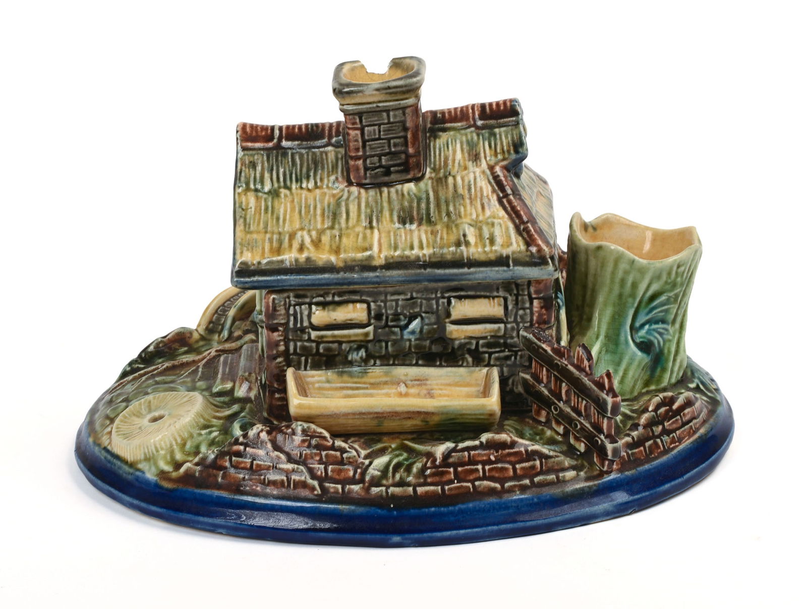 MAJOLICA STYLE MILLHOUSE FORM MATCHBOX.: Length 9 inches. Small chip to match holder.