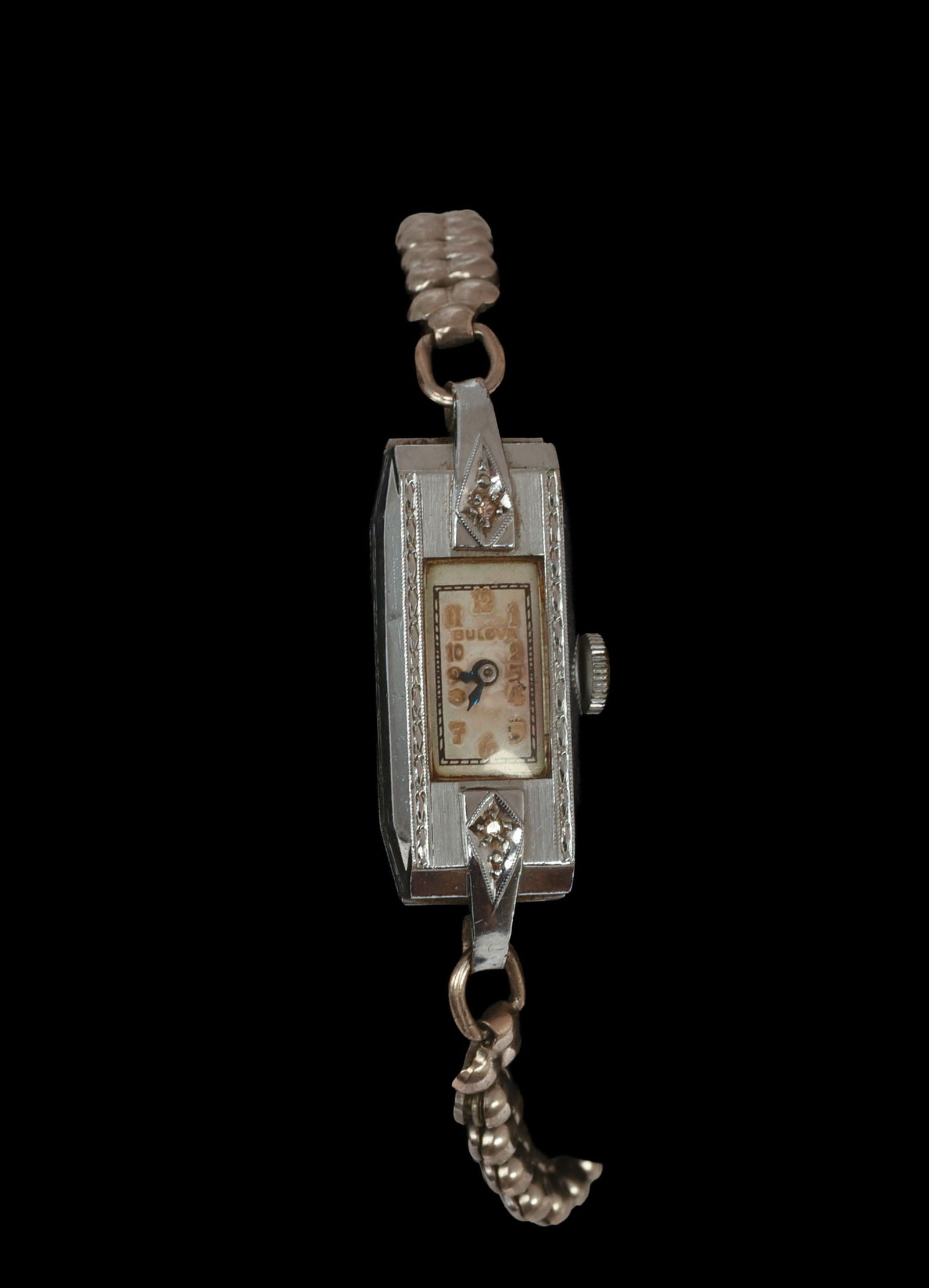 Bulova Lady's Watch.: Face 1 x .375 inches, flexible band. Appears to be in working order.