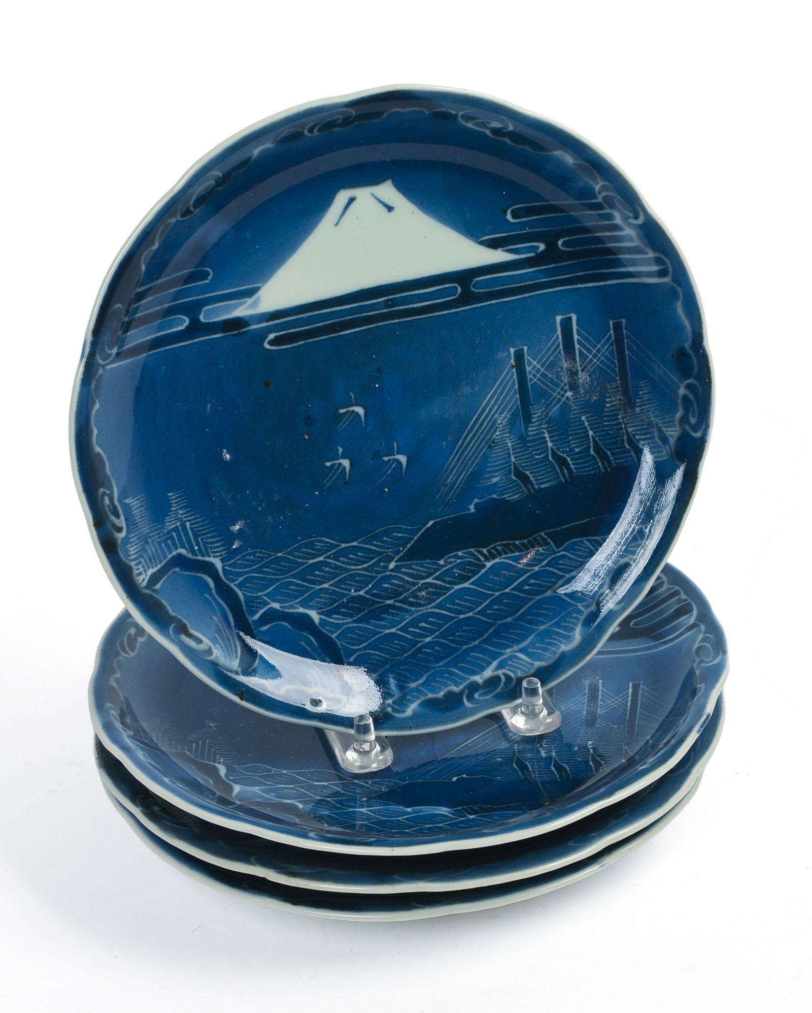 FOUR JAPANESE IMARI BLUE & WHITE PLATES.: Diameter 7.25 inches. Good condition.