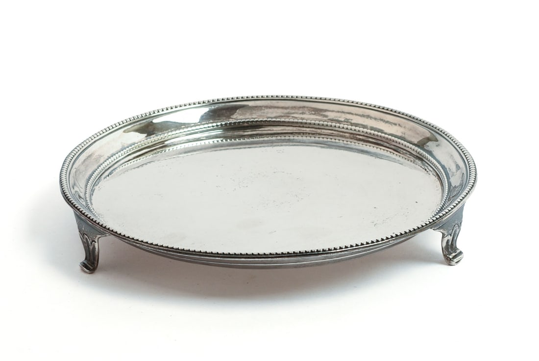 SMITH & SHARP GEORGE III LONDON STERLING SILVER CHARGER.: 1781, diameter 6.5 inches, 7 ozt. Provenance: William Walter Antiques, London, 1989.
