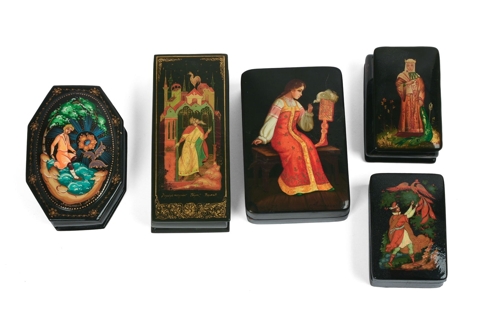 FIVE RUSSIAN BLACK LACQUER BOXES DEPICTING FOLK STORIES. (1 of 4)