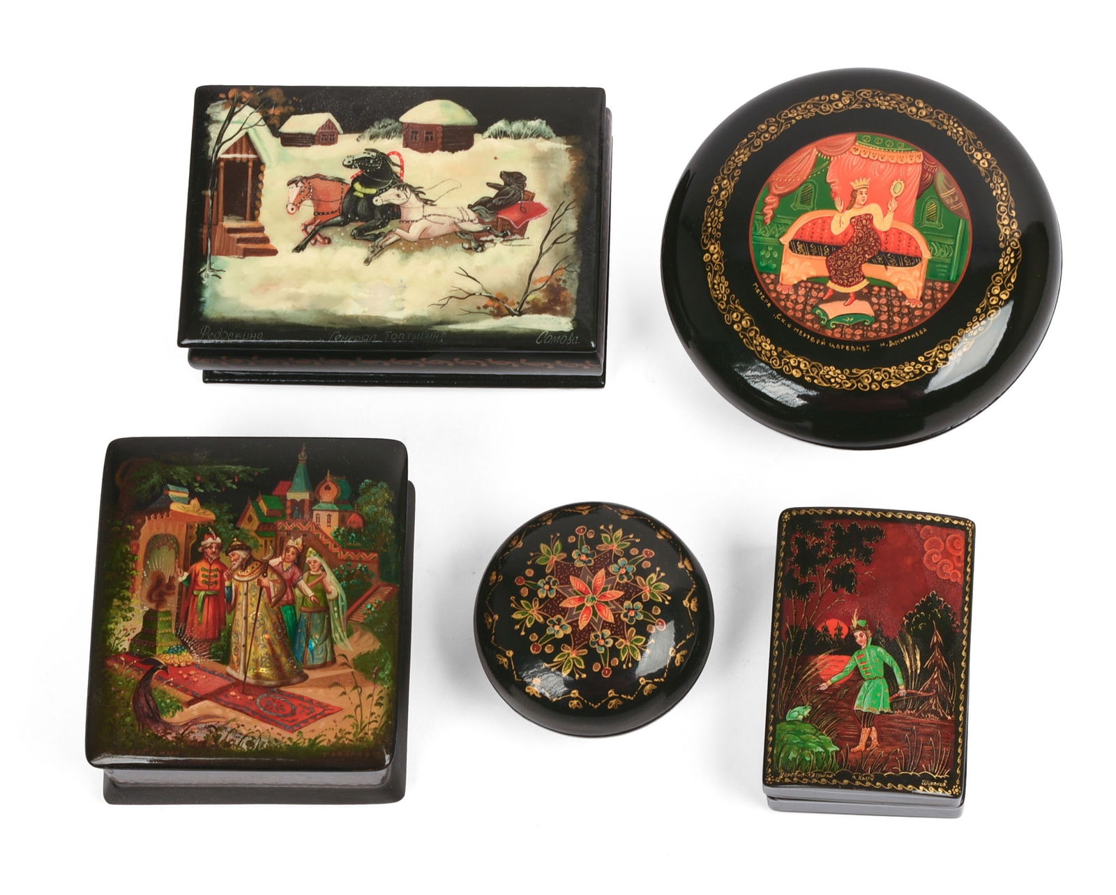 FIVE RUSSIAN BLACK LACQUER BOXES.: One depicting a sleigh, 3.25 x 2.25 x 1.25 inches, and four others.