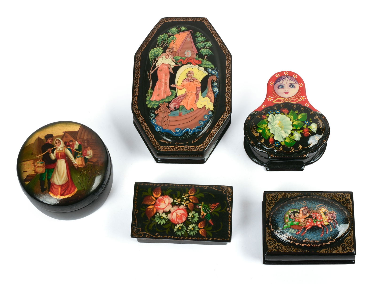 FIVE RUSSIAN BLACK LACQUER BOXES.: One in the form of a nesting doll, 2.75 x 2.75 x 1.125 inches, and four others.