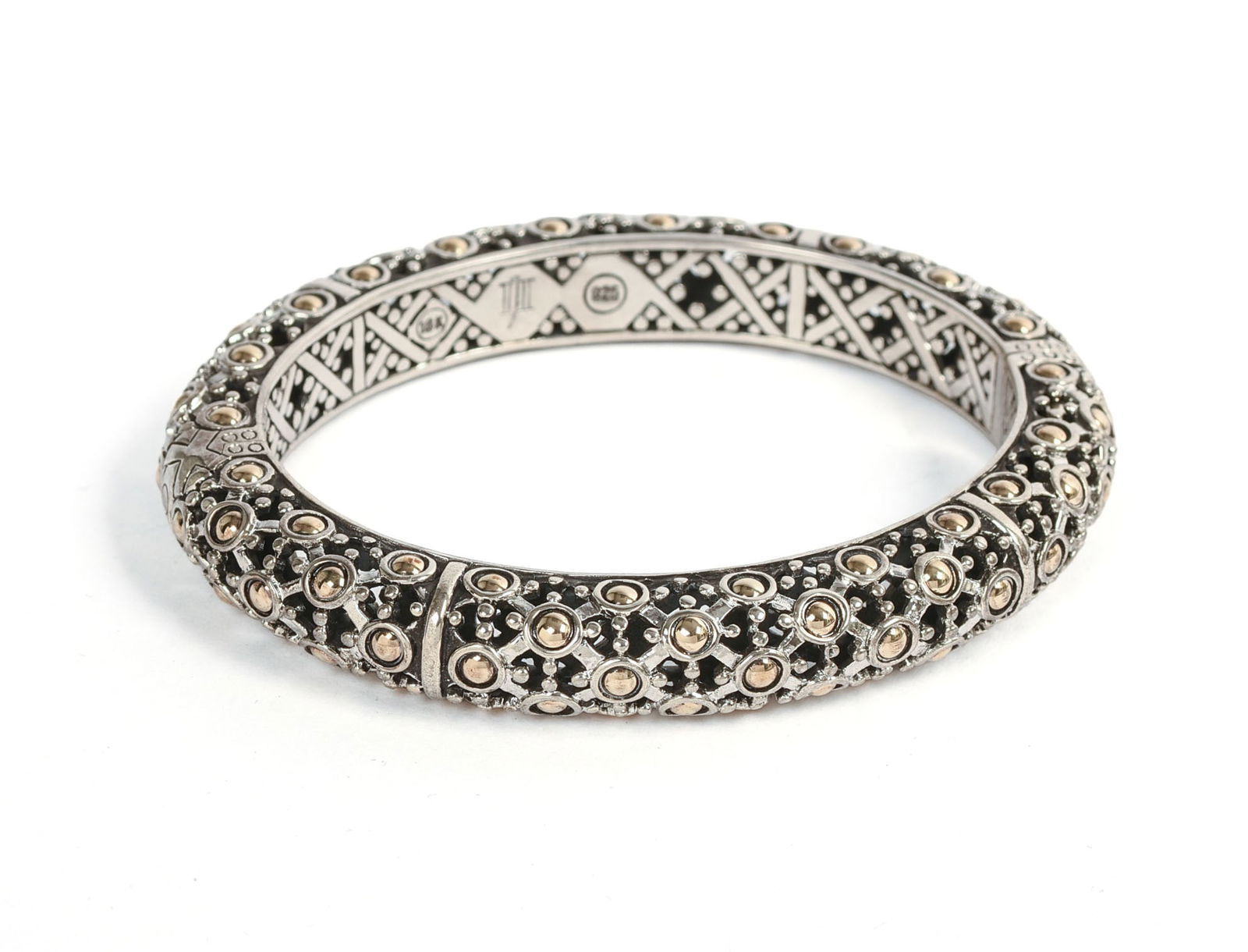 JOHN HARDY GOLD AND SILVER BANGLE BRACELET.: Inside diameter 2.25 inches, opens to accommodate wrist. 51.36 grams. Retail price $1,895.