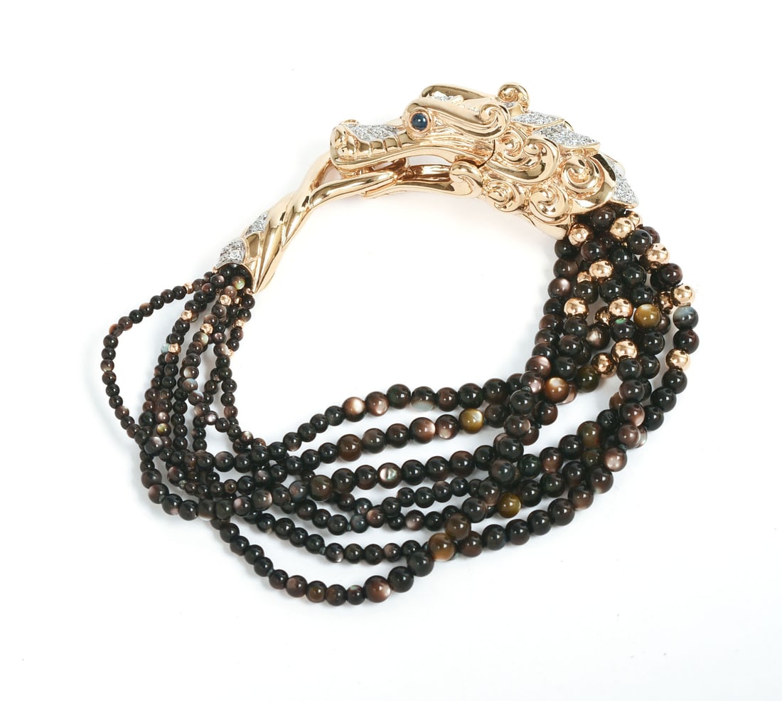 JOHN HARDY 18K GOLD AND DIAMOND BRACELET WITH DRAGON.: With black mother of pearl beads. Diameter 2.5 inches, 61 grams. Excellent condition.