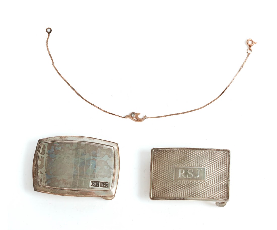 TWO STERLING SILVER BELT BUCKLES AND A GOLD TONE BRACELET. (1 of 4)