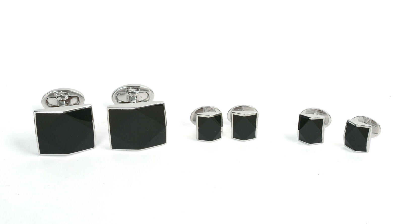 JAN LESLIE STERLING SILVER AND ONYX CUFFLINK AND SHIRT STUD SET.: Cufflinks 0.5 x 0.75 inches, new in box.