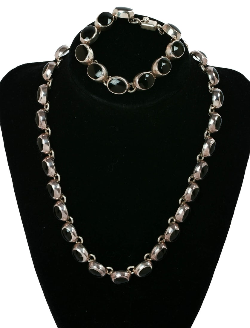 Sterling and Onyx Necklace and Bracelet Set.: Length of necklace 16 inches, bracelet 6 inches. 110 grams.