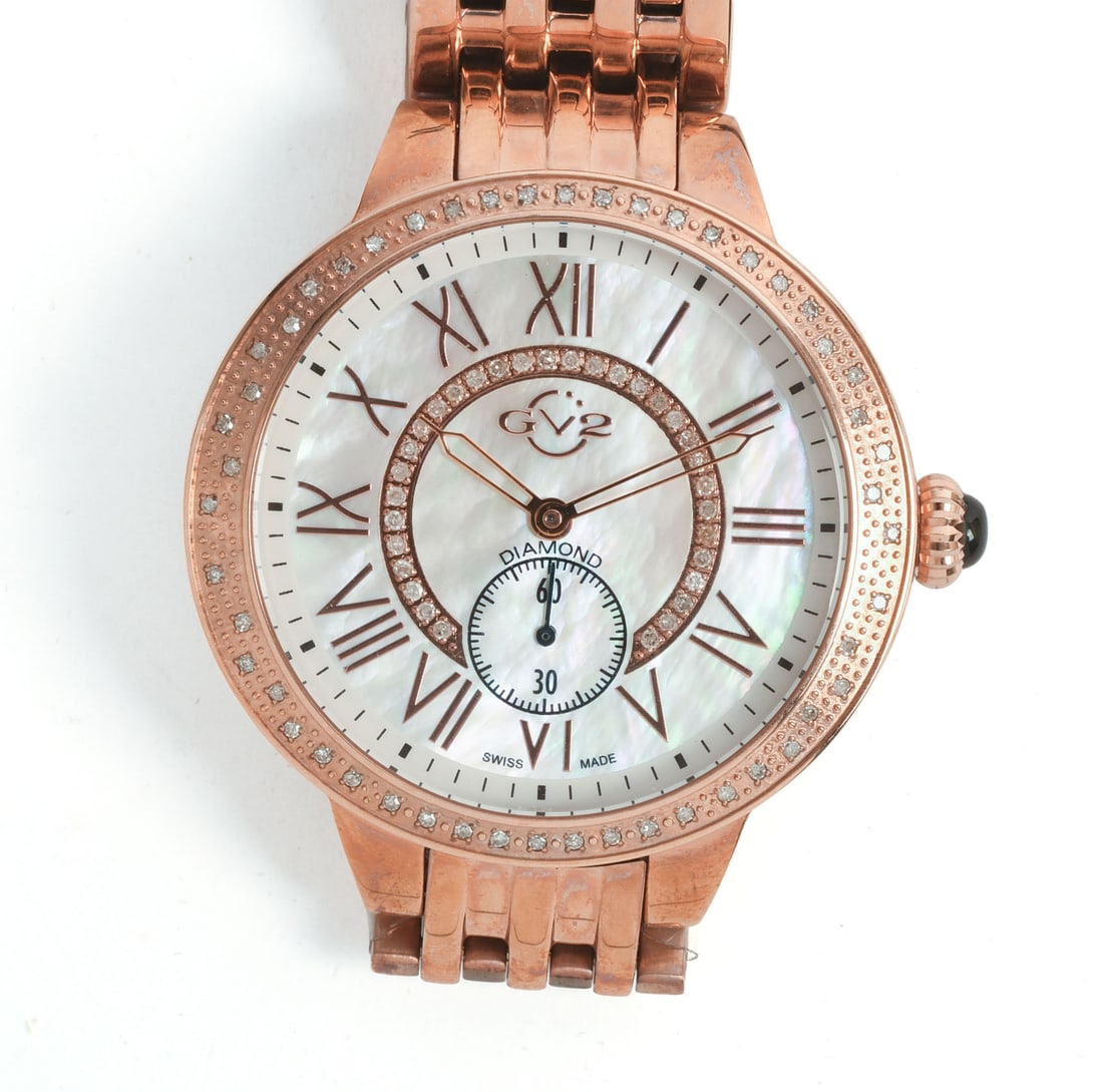 GEVRIL WATCH WITH DIAMONDS.: Face diameter 1.5 inches, band diameter 2.75 inches. New in box.