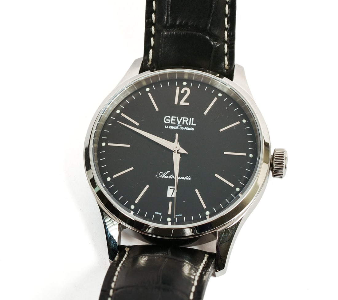 GEVRIL MEN'S WATCH.: Face diameter 1.625 inches, band diameter 2 to 2.5 inches.