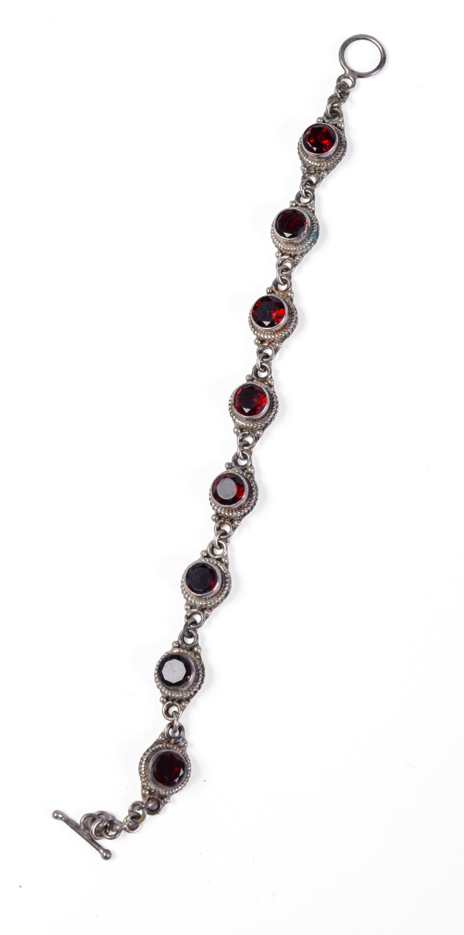 STERLING SILVER AND GARNET BRACELET. (1 of 4)