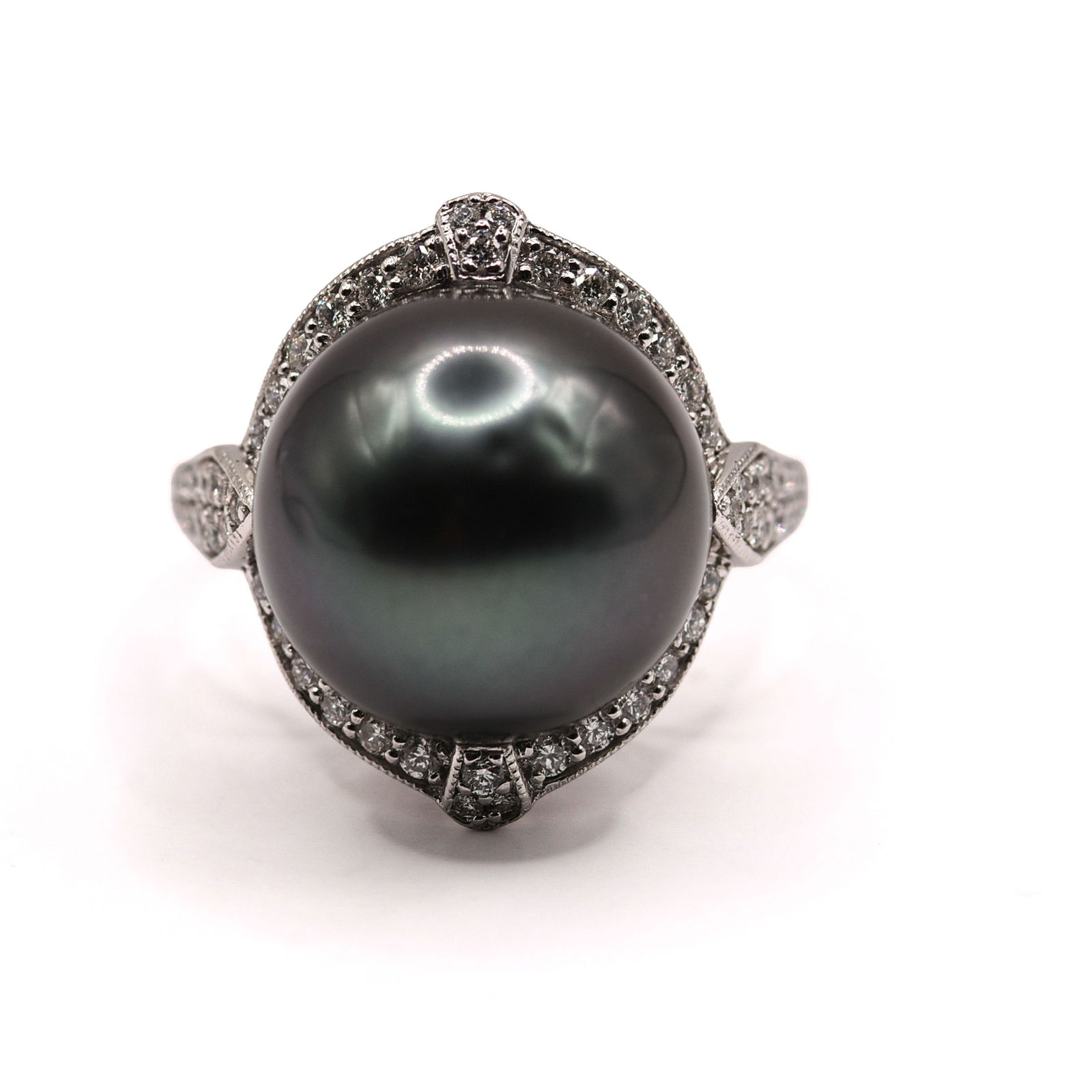 PLATINUM CULTURED SOUTH SEA TAHITIAN PEARL AND DIAMOND RING: Cultured South Sea, dark gray with orient overtones Tahitian pearl, 20.63 CT. Round brilliant cut accent stones, 0.50 CT, 64 pieces. Gross total weight 10.5 grams. Size 6.75.